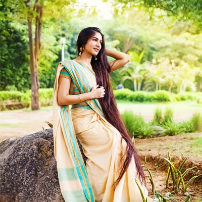 Portrait of Pretty Young Indian Girl Wearing Traditional Saree and  Jewellery Playing with Colors and Posing Fashionable with Stock Image   Image of outdoor colourful 215085367