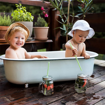 6 month baby boy photoshoot ideas at home baby in an outdoor hottub 